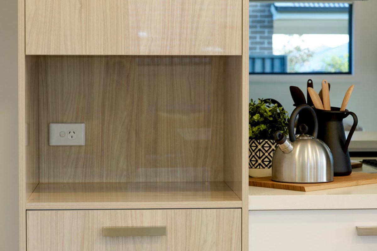 Kaplan Homes kitchen power socket microwave space